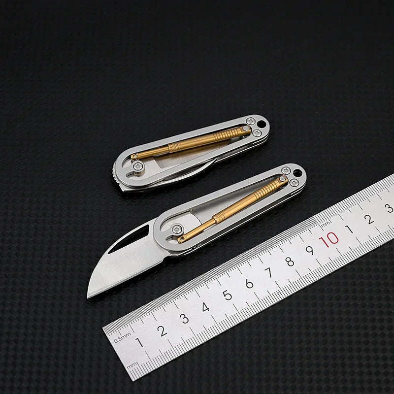 Swing arm folding knife